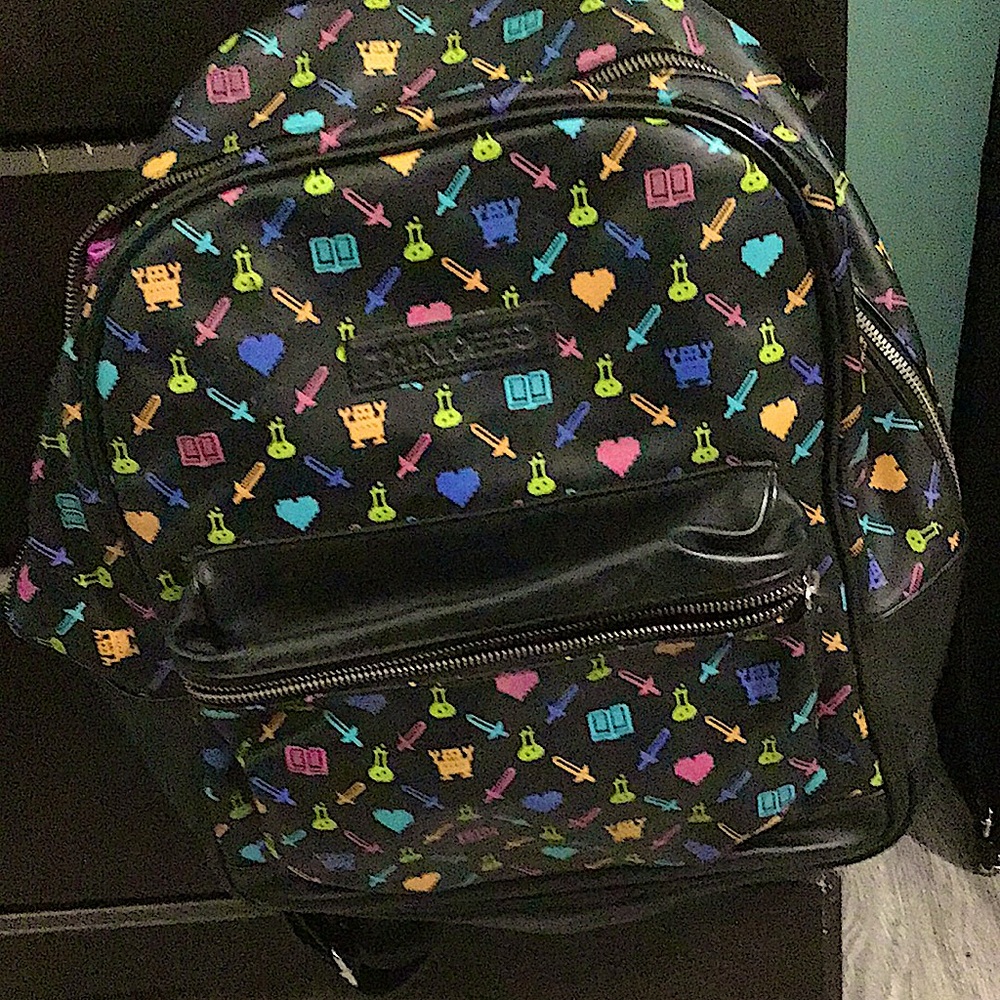 Black 8-bit pleather bag